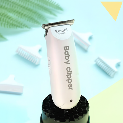 Baby hair clipper on charging stand with creative turquoise background